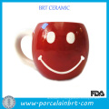 Tasse en céramique souriante pour le café